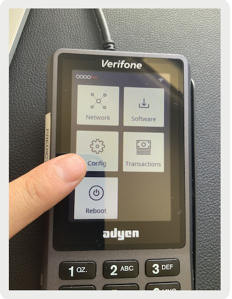 The Config button on an Ayden payment terminal.