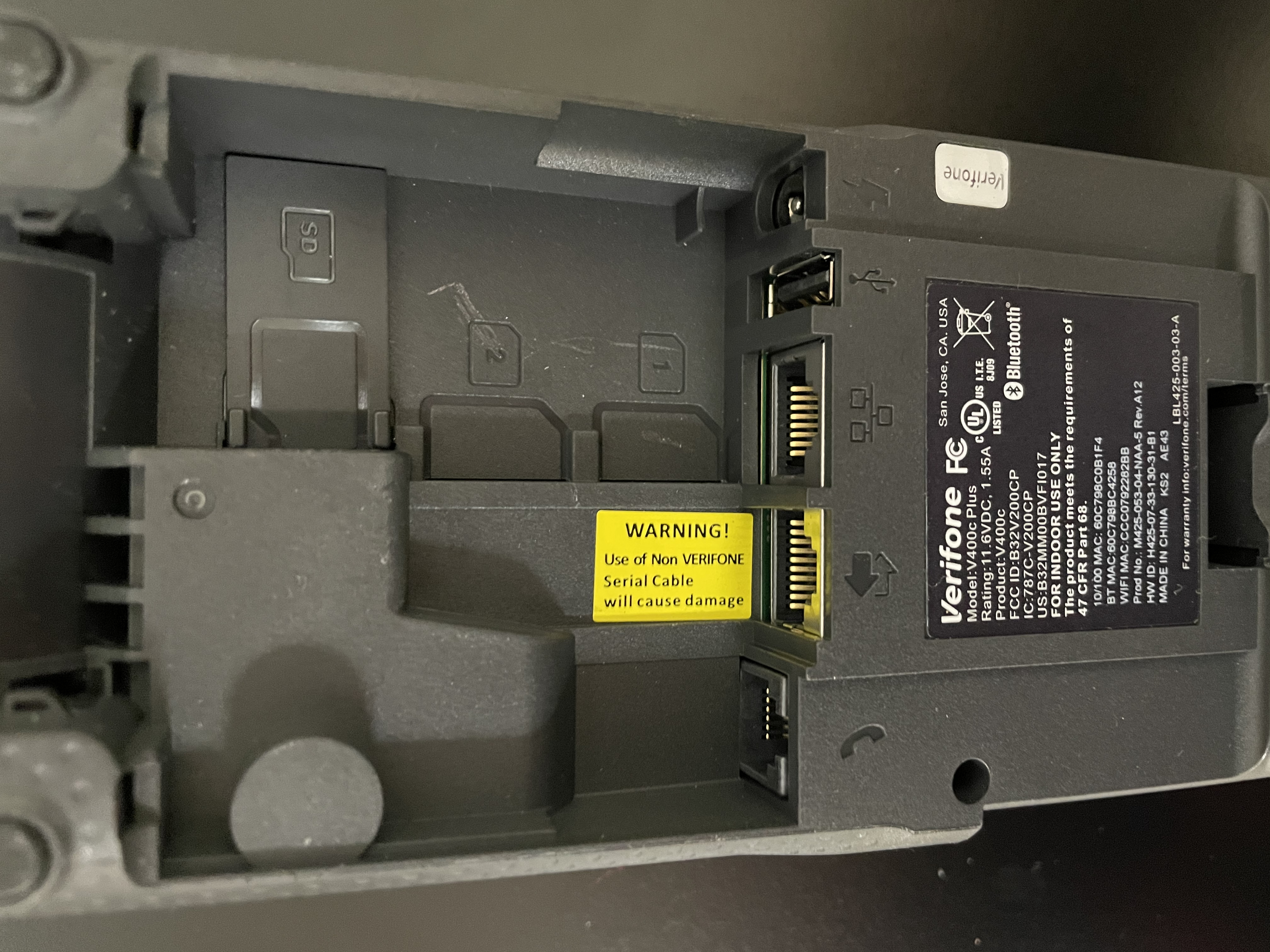 The LAN cable plug next to the USB slot on an Ayden device.