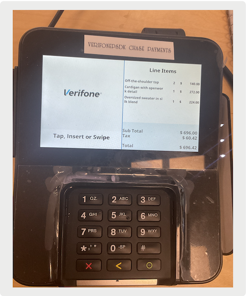 An m400 model Verifone terminal.