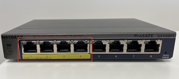 The yellow ports on the cash drawer where you attach PoE switches