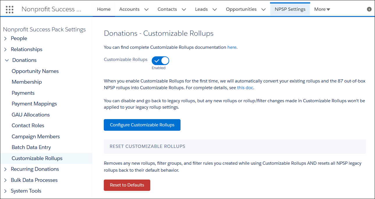 Customizable Rollups page in NPSP Settings. Shows that the toggle is set to Enabled, so the Configure Customizable Rollups, and Reset to Defaults buttons are present.